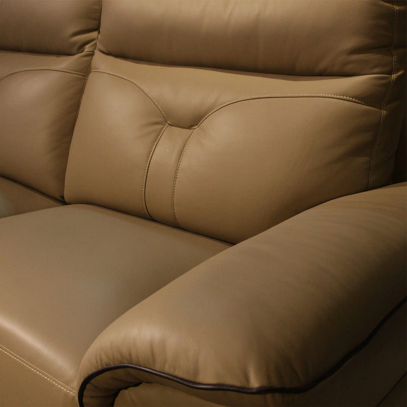 Close-up of a brown leather sofa