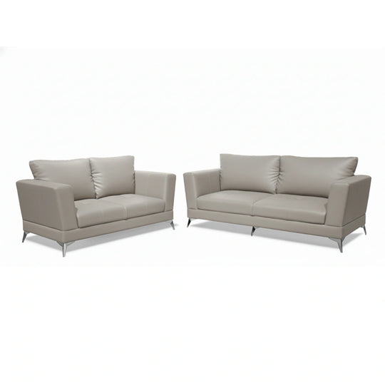 Two beige leather sofas