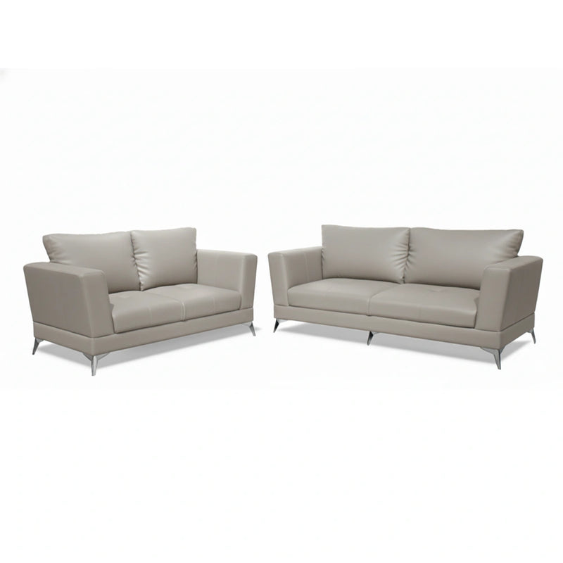 Two beige leather sofas