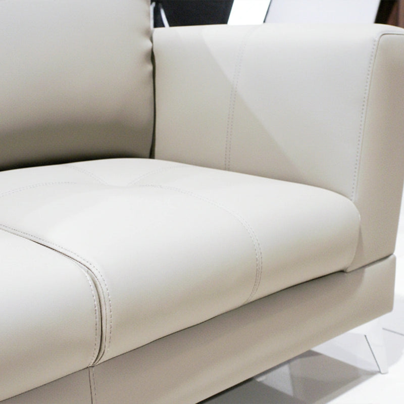 Close-up of a beige leather sofa