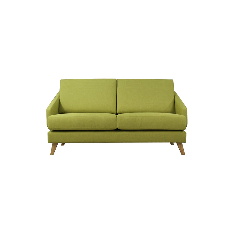 Green sofa on a white background