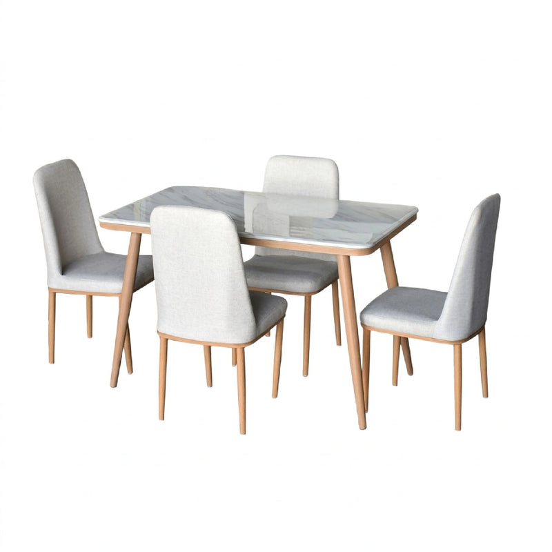 Dining table set with four chairs on a white background