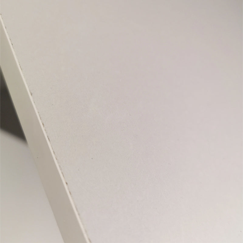 Close-up of a white surface with a subtle texture