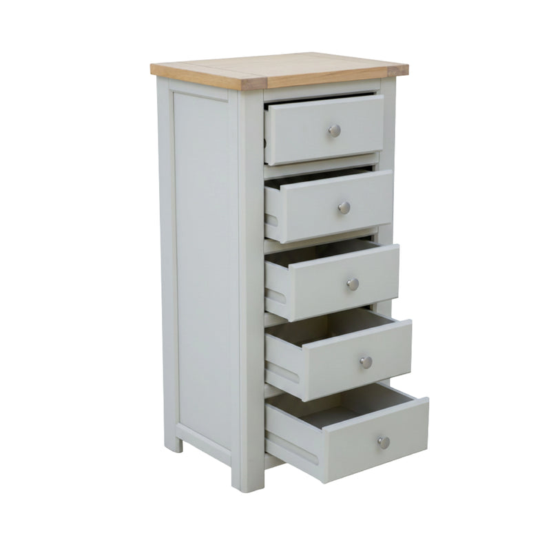 Tall white dresser with five drawers and a wooden top on a white background