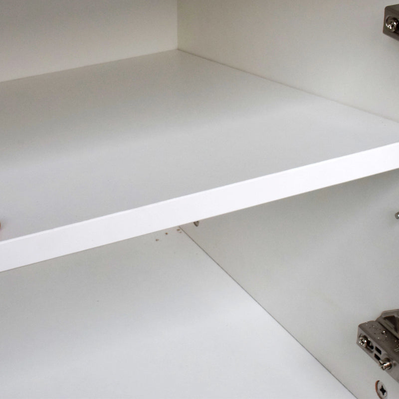 Close-up of a white shelf with a strip light underneath