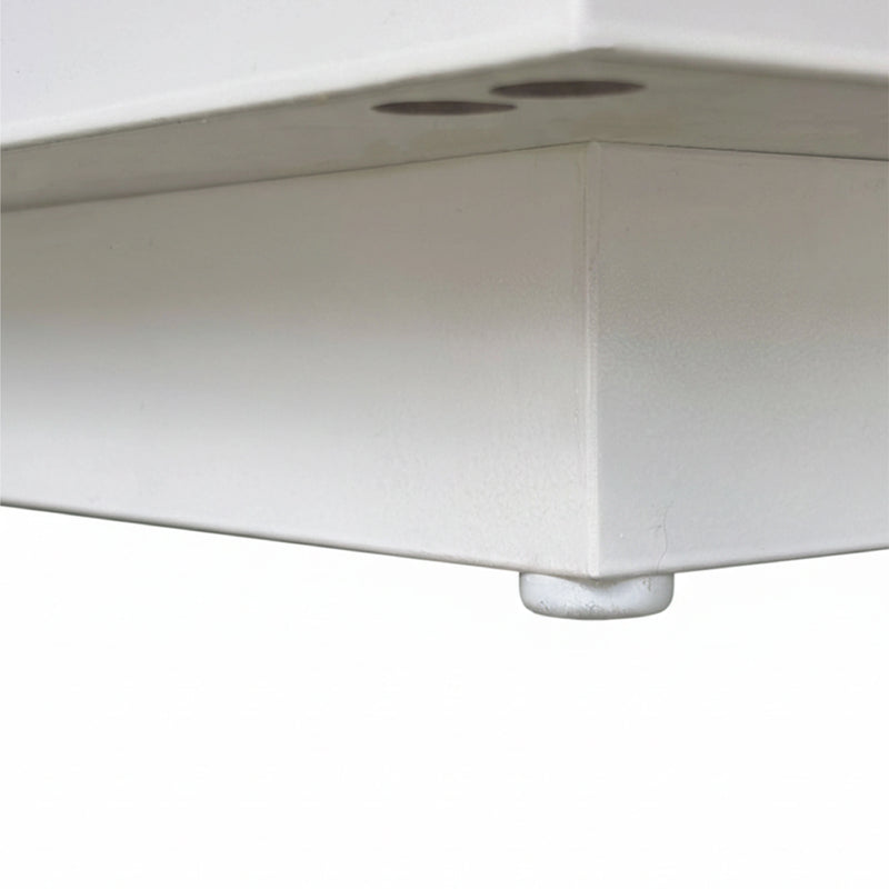 Close-up of a white corner bracket on a white background