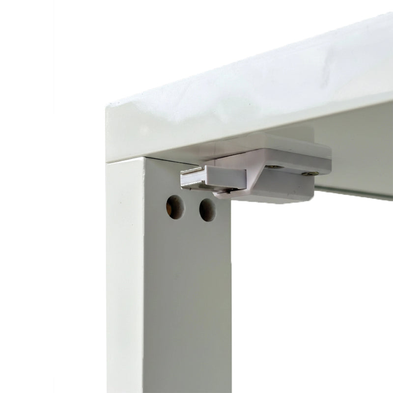 Close-up of a white desk with a metal leg and connector on a white background
