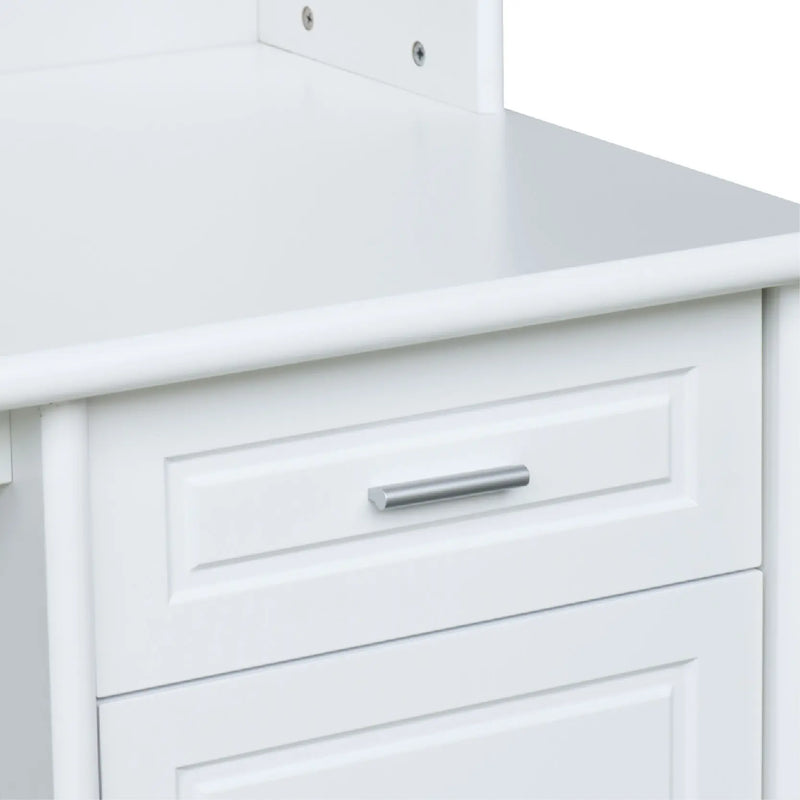 Close-up of a white kitchen cabinet with a drawer and handle