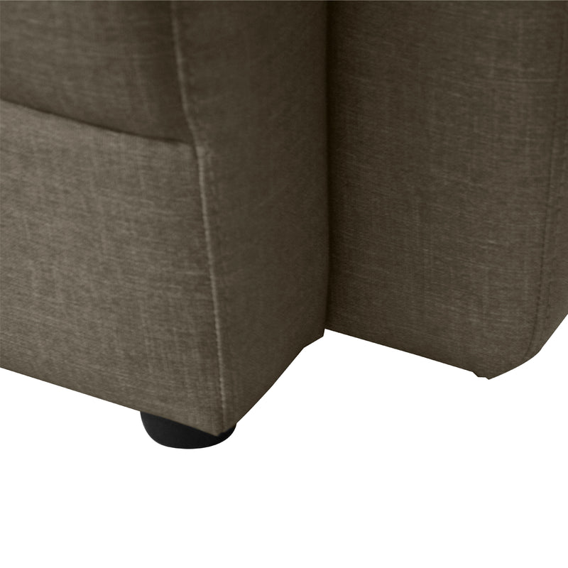 Close-up of a brown upholstered chair corner