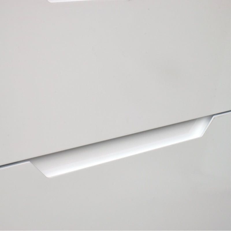 Close-up of a metallic strip on a light gray background