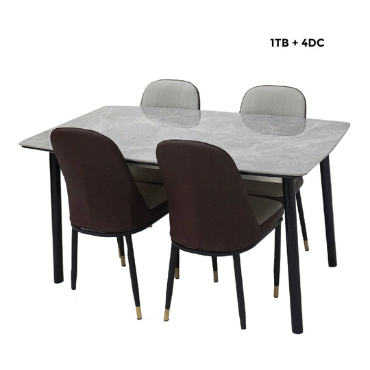 Dining table set with four chairs on a white background