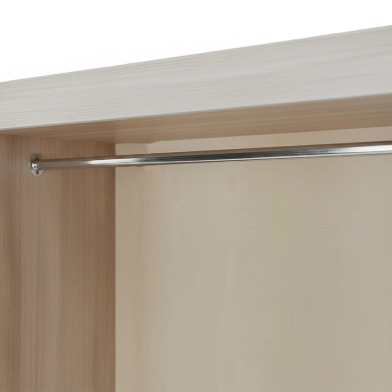 Closet rod mounted on a wooden wardrobe with a white background
