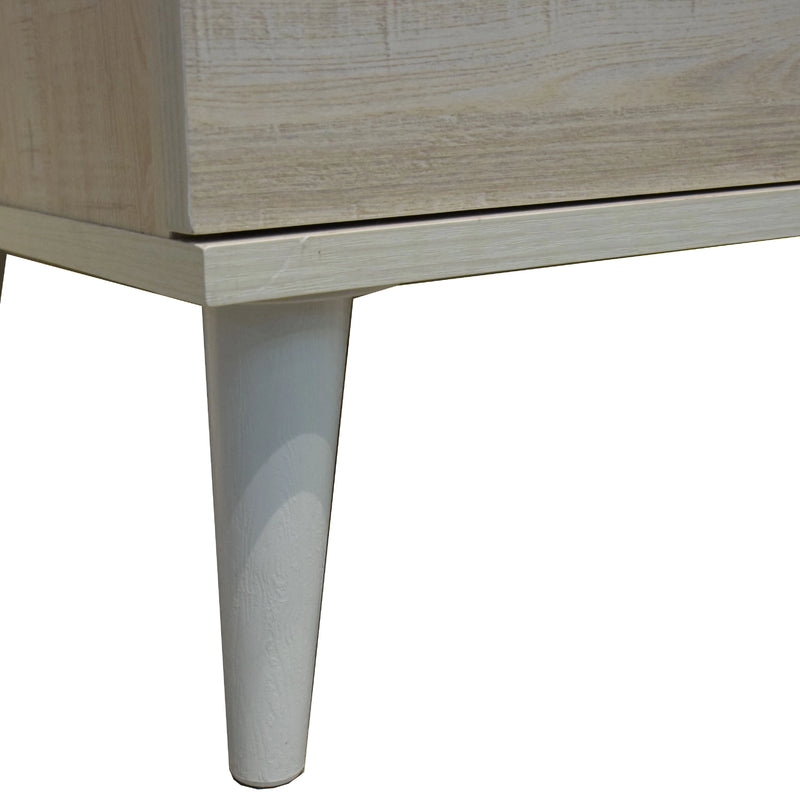 Close-up of a wooden cabinet leg on a white background