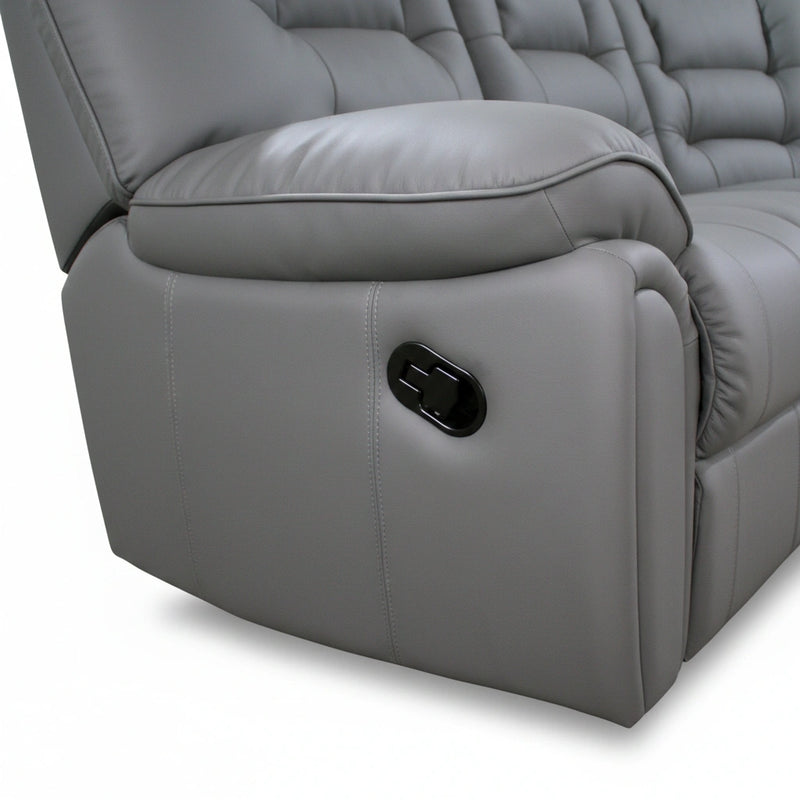 Gray recliner chair with a control panel on a white background