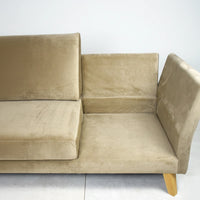 Beige sectional sofa on a white background