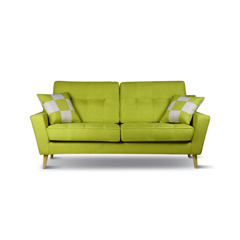 Green sofa with two cushions on a white background