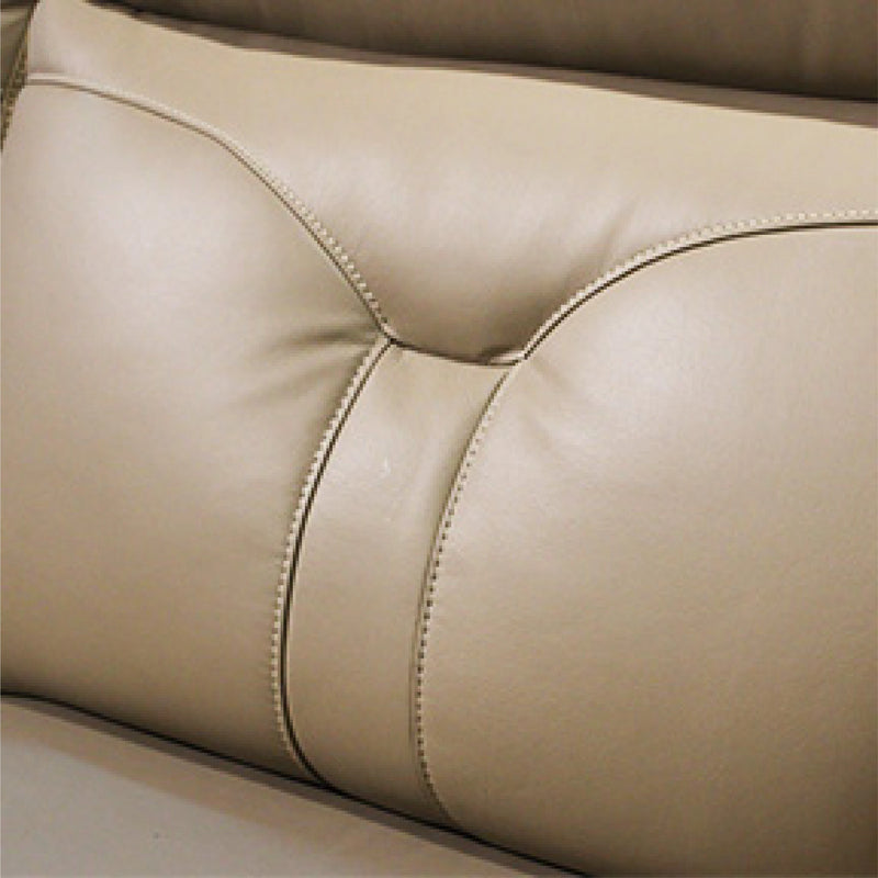 Close-up of beige leather car seat with stitching detail