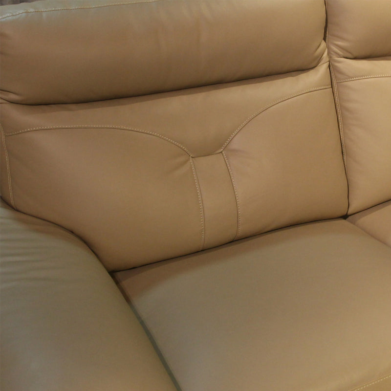 Close-up of a beige leather sofa