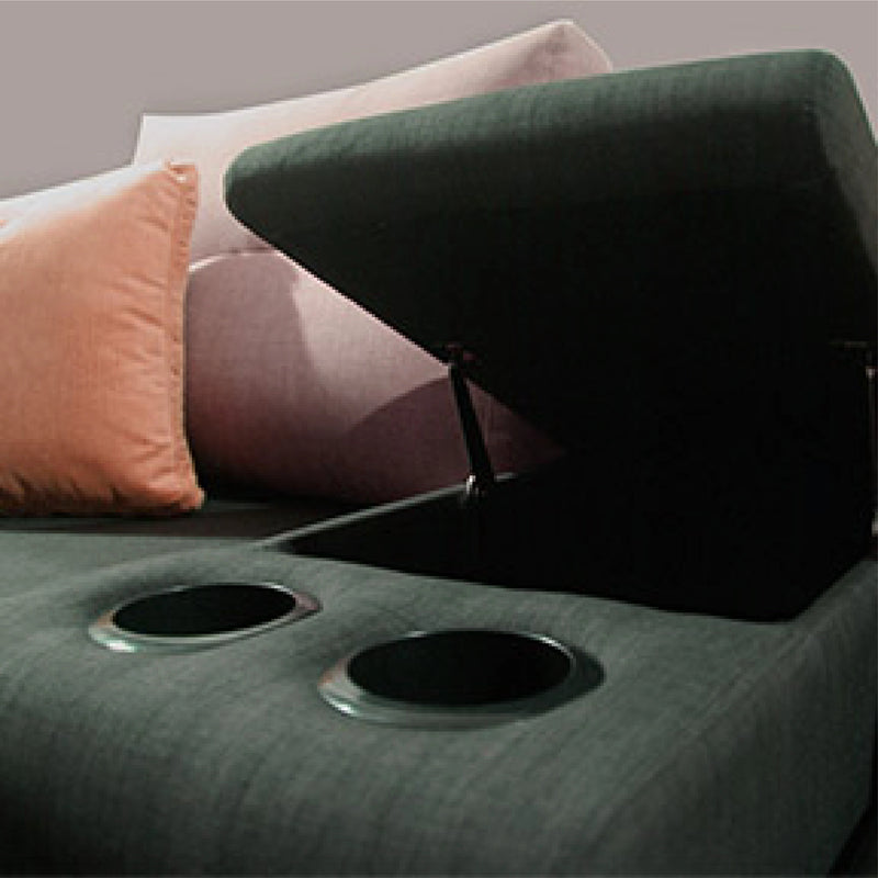 Green car seat with cup holders and pink cushions on a gray background