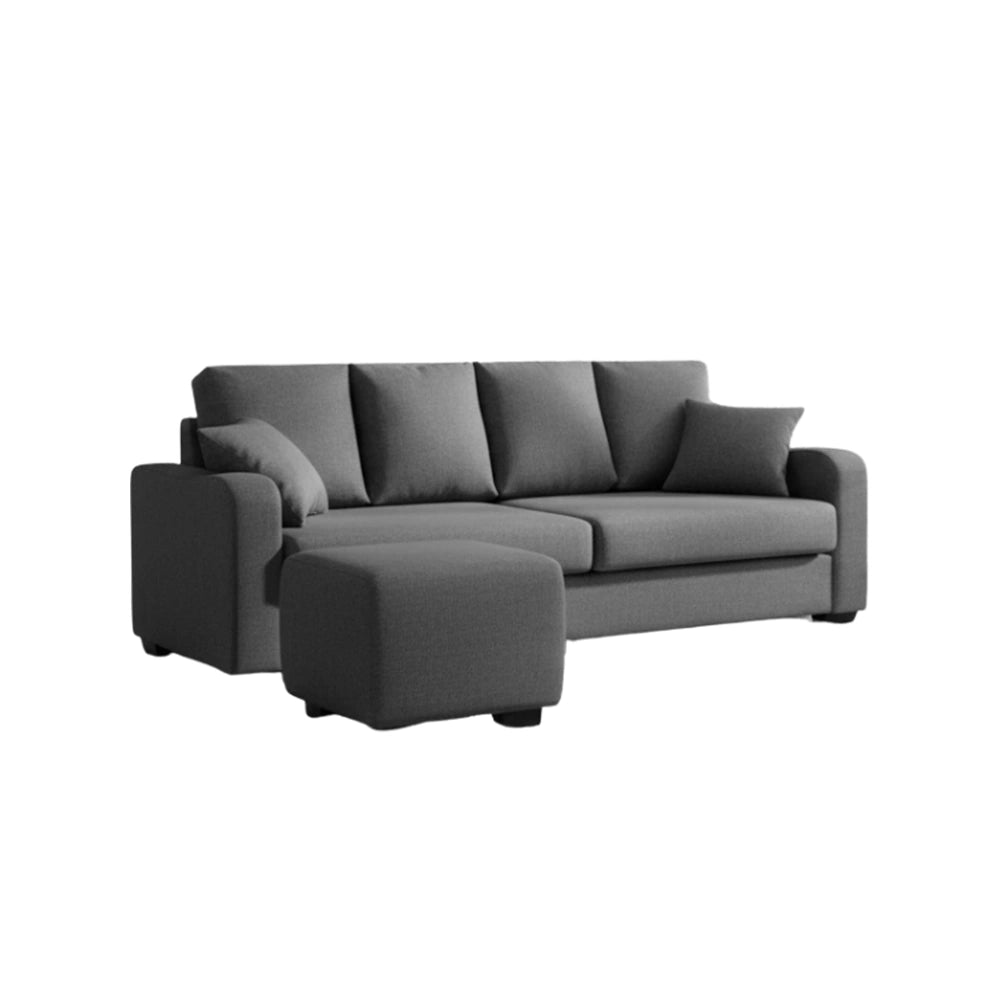 Gray sofa with matching ottoman on a white background
