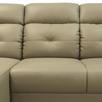 Beige leather sectional sofa with a close-up view of the cushions.