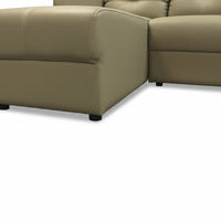 Brown leather sectional sofa on a white background