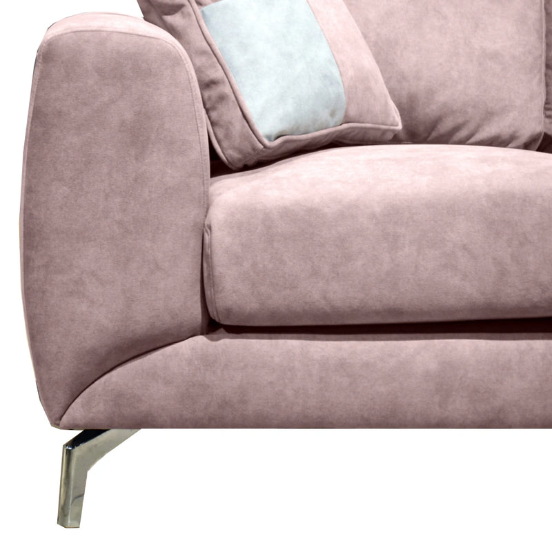 Close-up of a pink sofa with a pillow on a white background