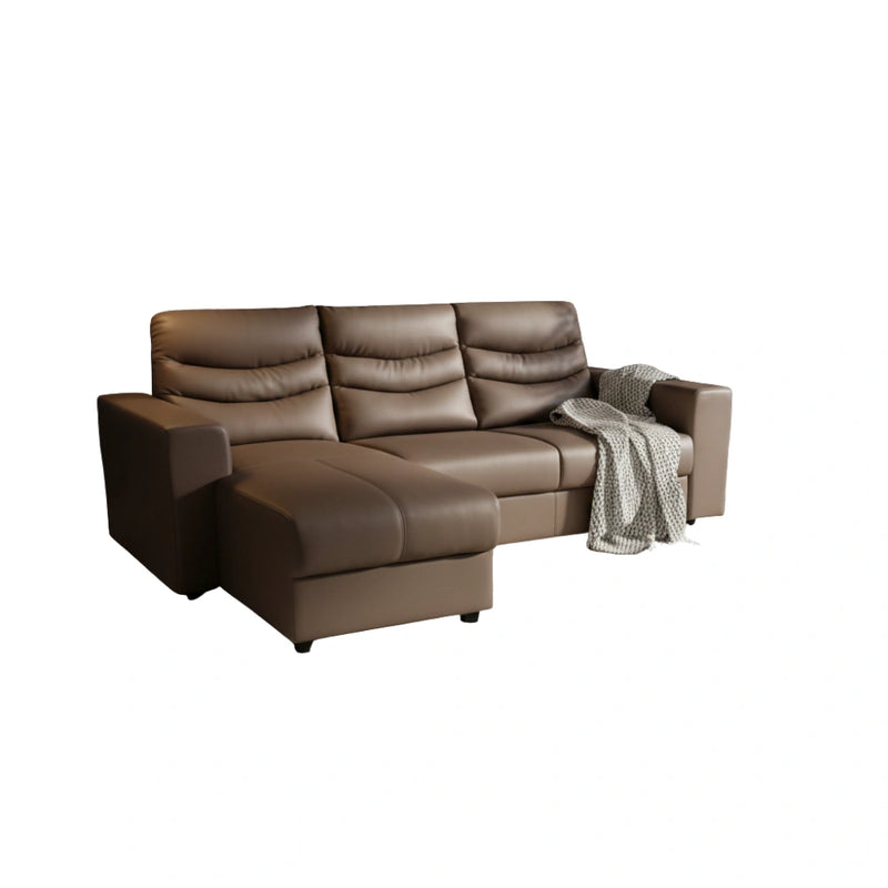 Brown leather sectional sofa with a blanket