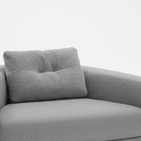 Gray sofa with a cushion