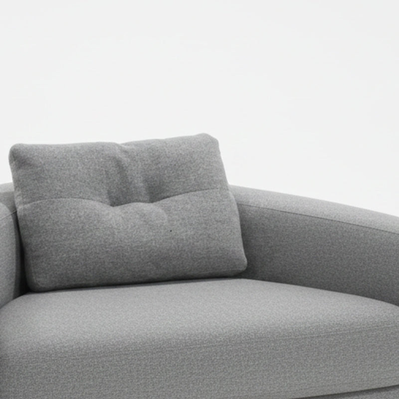 Gray sofa with a cushion