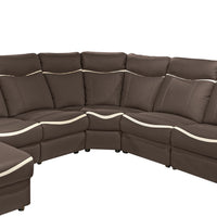 Brown sectional sofa with white trim on a white background