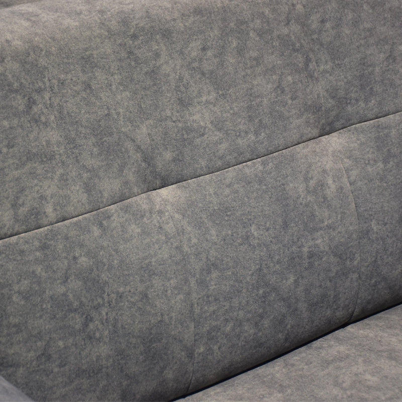 Close-up of a textured gray fabric surface
