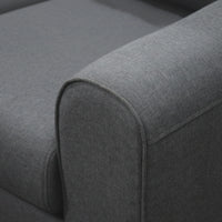Gray fabric surface of a sofa with a focus on texture and color.