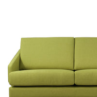 Green sofa on a white background