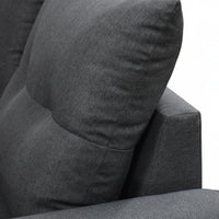 Gray fabric armchair with a pillow on a white background