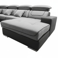 Gray and black sectional sofa on a white background