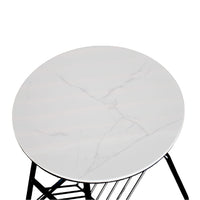 Round white cushion on a black metal stool against a white background