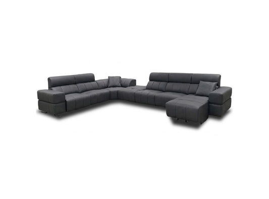 A modern dark gray sectional sofa with a chaise lounge, shown from a three-quarter angle on a plain white background.