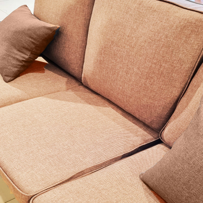 Brown fabric sofa with cushions