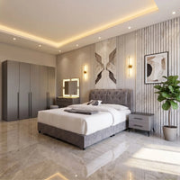 Modern bedroom with gray bed, wardrobe, and decorative elements.