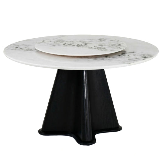 Round table with marble top and black base on a white background
