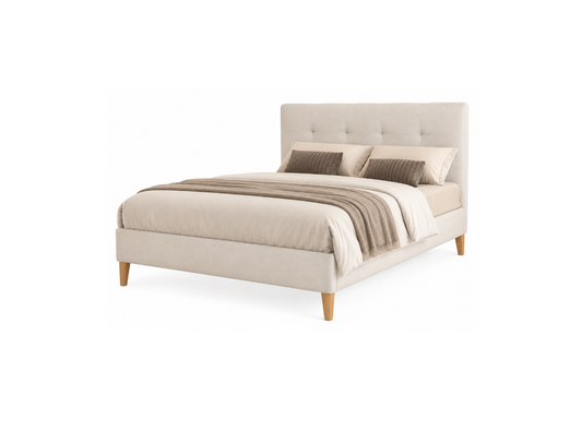 An upholstered bed frame in a light beige fabric with a tufted headboard and tapered wooden legs, styled with neutral beige and brown bedding on a solid white background.