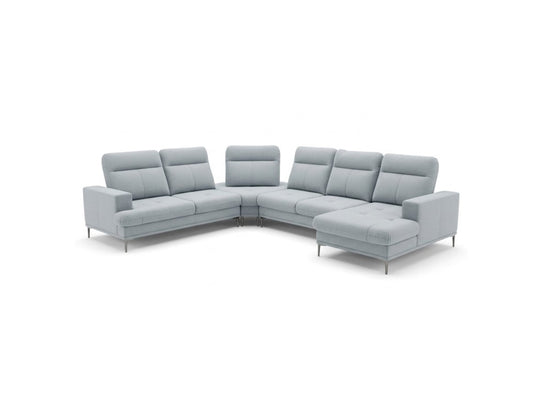 A modern light gray sectional sofa with a chaise lounge, shown from a three-quarter angle