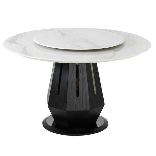 Modern table with white marble top and black geometric base on a white background