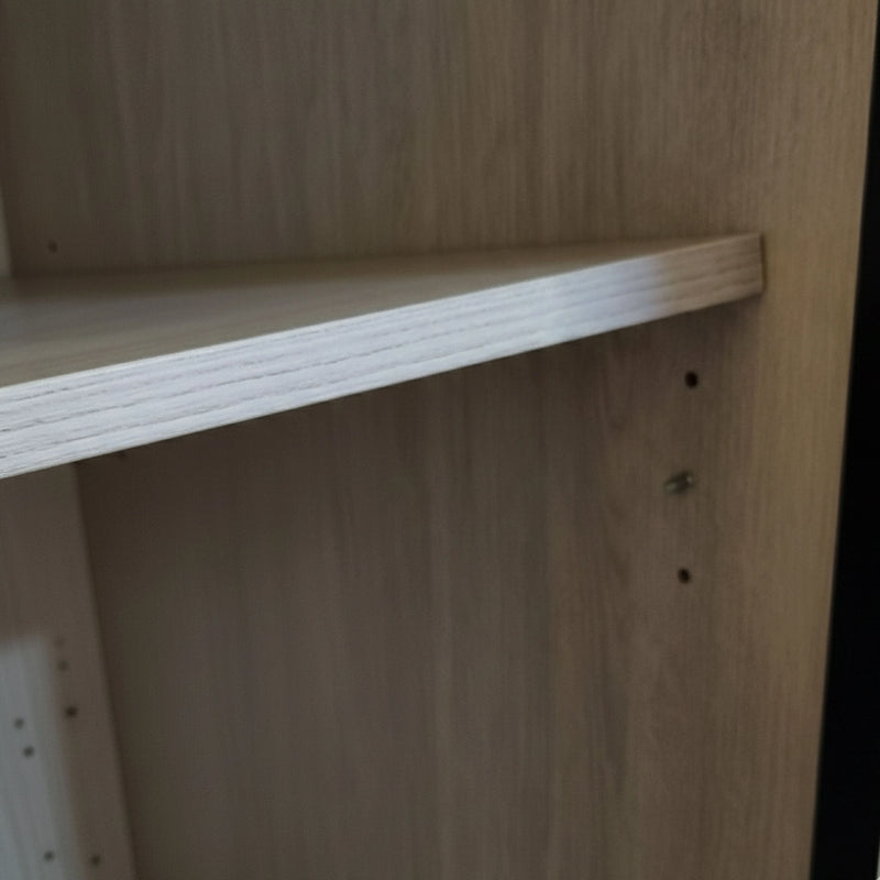 Wooden shelf with a plain background