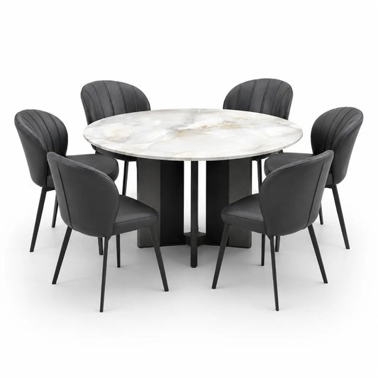A modern dining set featuring a round white marble-patterned table with a black pedestal base, surrounded by six black upholstered chairs with dark metal legs, shown on a solid white background.