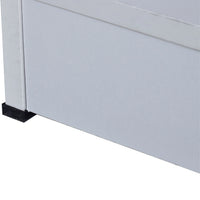 Close-up of a white cabinet with a black base on a white background