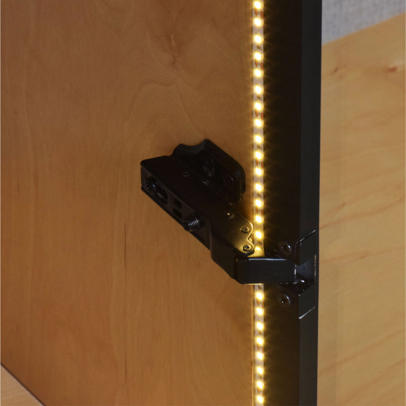 LED strip light attached to a wooden surface