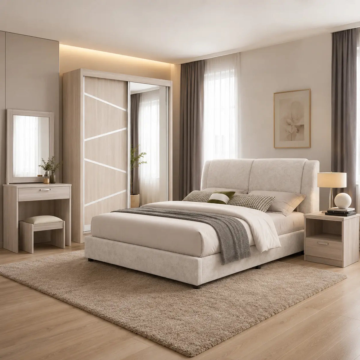 A modern bedroom featuring a light beige upholstered bed with a high padded headboard, styled with neutral-toned bedding and a gray throw blanket. The room includes a matching light wood vanity table with a mirror, a tall light wood wardrobe with sliding glass doors, a large beige shag rug, and a light wood nightstand with a lamp.