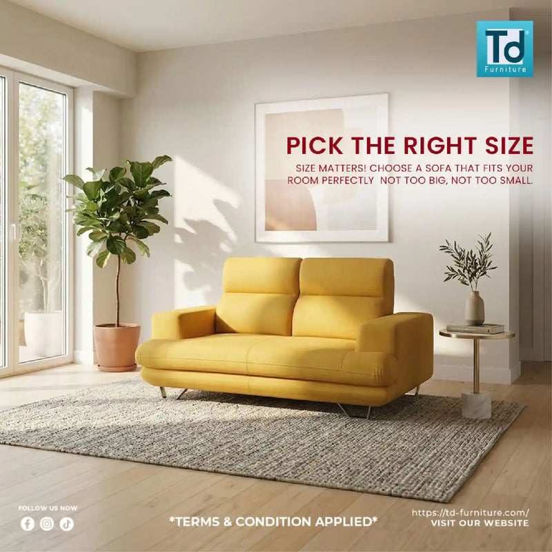Yellow sofa in a modern living room with a TD Furniture advertisement.